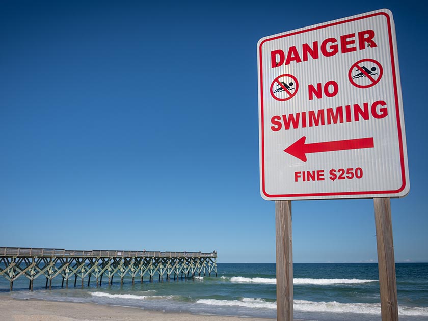 Photo of beach warning sign