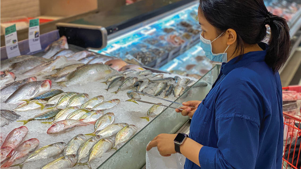 person shopping for seafood